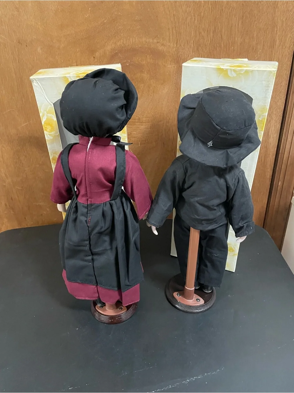 Porcelain Boy and Girl Dolls in Black, Blue and Burgundy Clothing